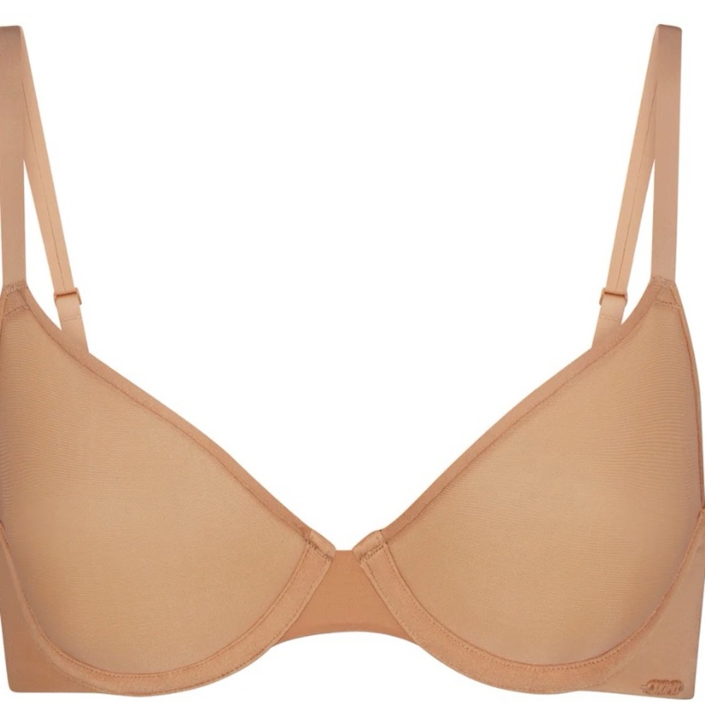 Two Skims weightless Demi bras 38D skims hardware logo, colors cocoa and ochre.